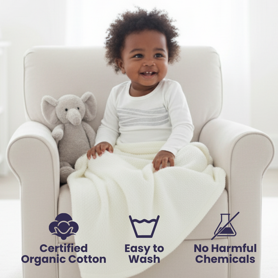 Child sitting in a chair wearing a Sleep of Mind pajama top, with a blanket, surrounded by icons indicating certified organic cotton, easy to wash, and no harmful chemicals.