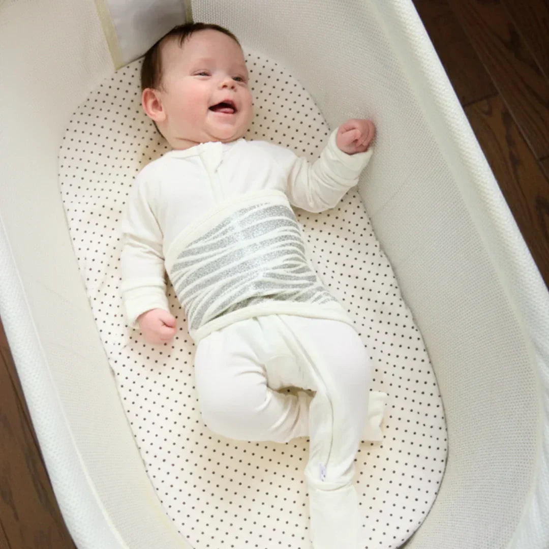 Baby wearing one piece Sleep of Mind breathing reassurance pajamas