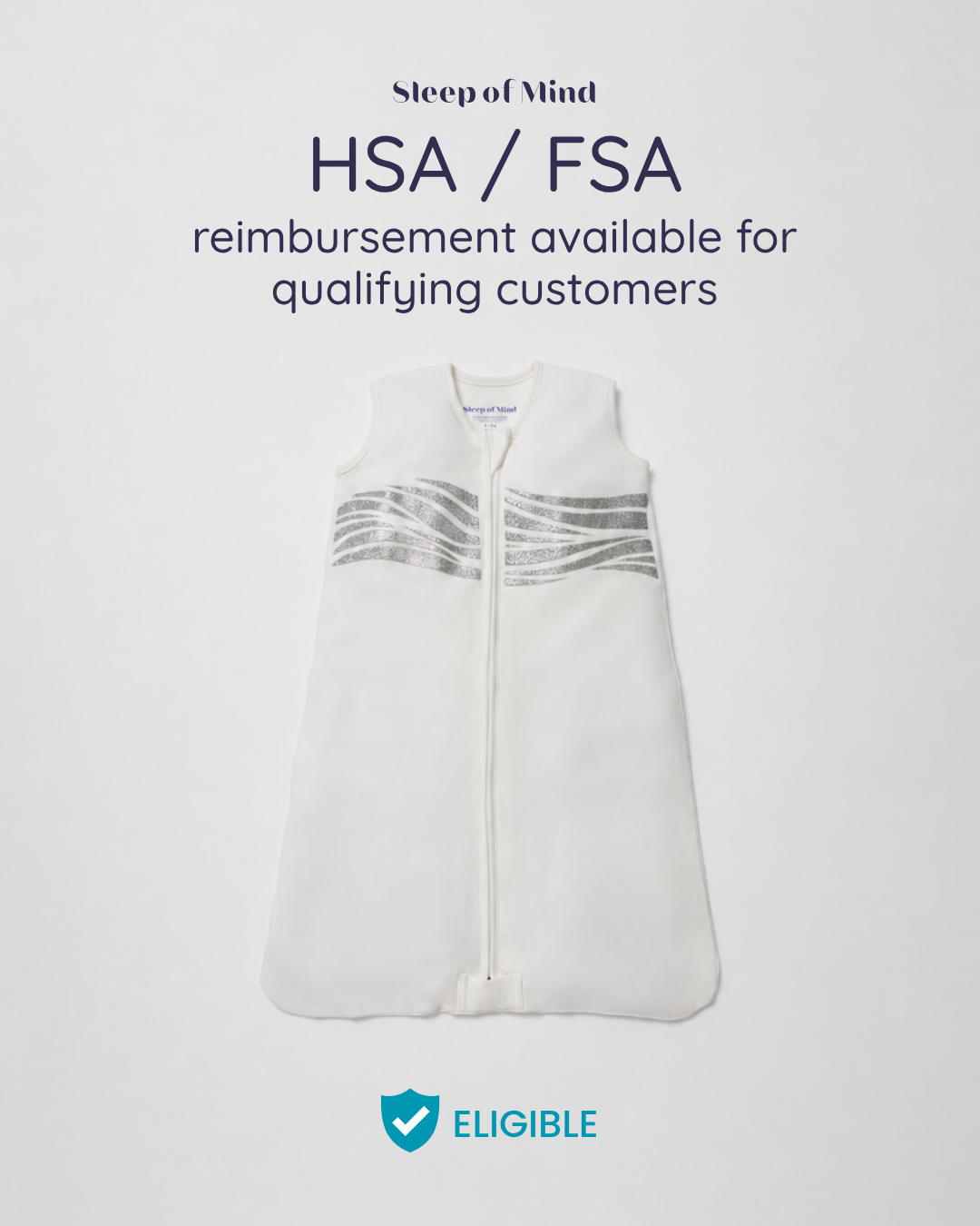 White baby sleeping bag with silver accents on a light gray background, featuring text about HSA/FSA eligibility. 