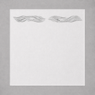 White swaddle blanket with silver sparkly reflective waves on a gray background