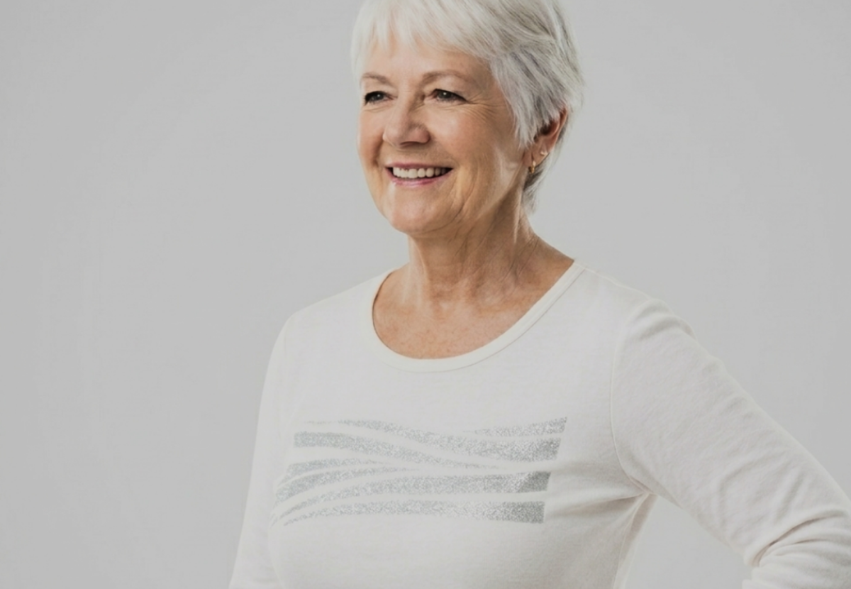 Senior citizen wearing a sleep-of-mind pajama top 