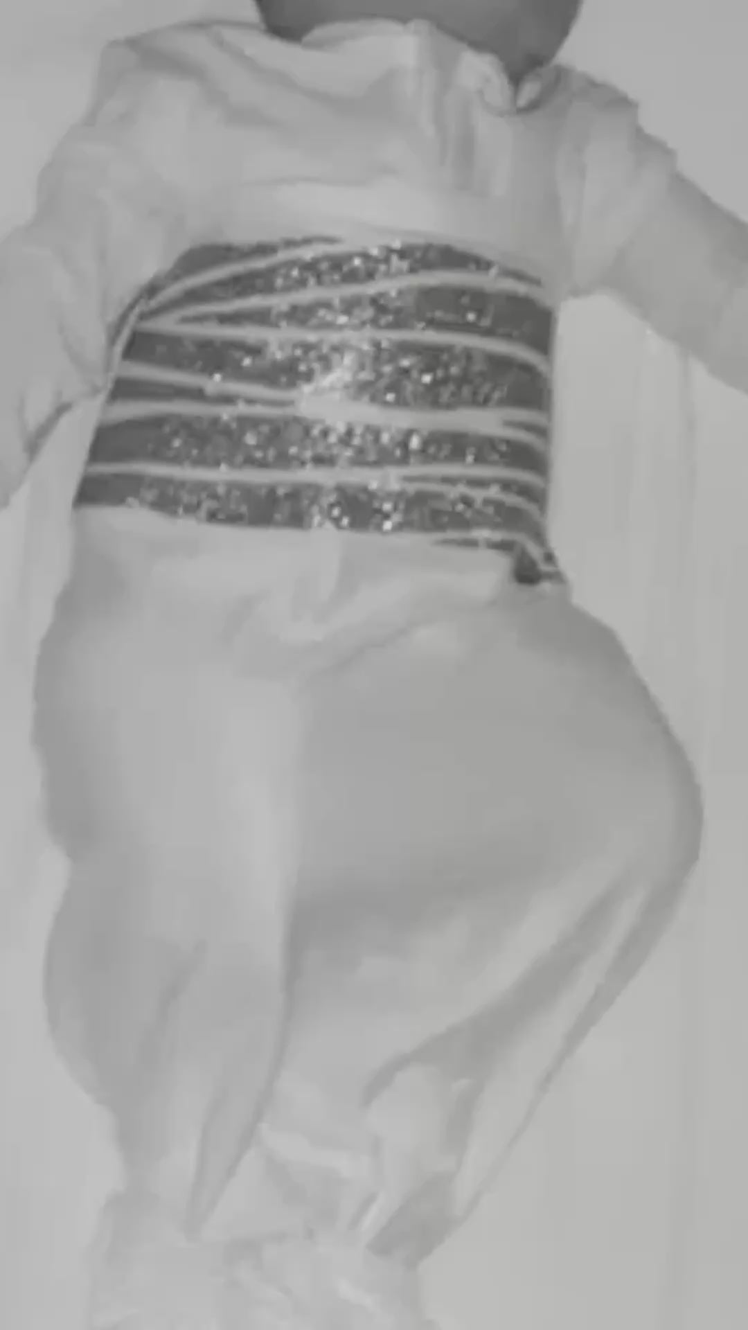Night vision camera footage of baby wearing newborn swaddle blanket from Sleep of Mind 